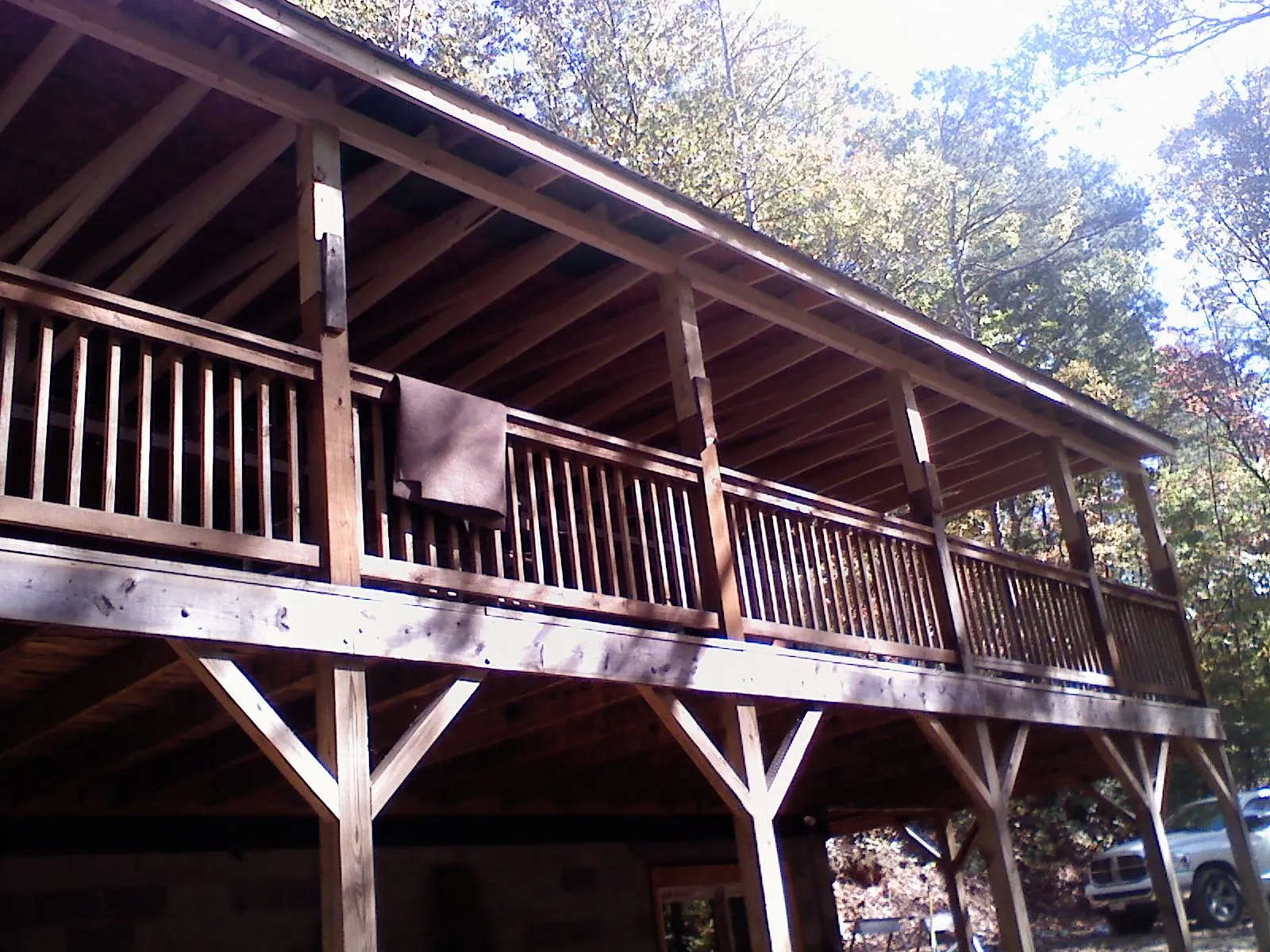 Timber framing under a new elevated porch and deck — Roof Leak Repair in Fort Bridger by Roofing Brothers